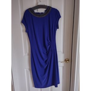 Elegant dress, bright blue color,ruched around the waist. Size large regular.
